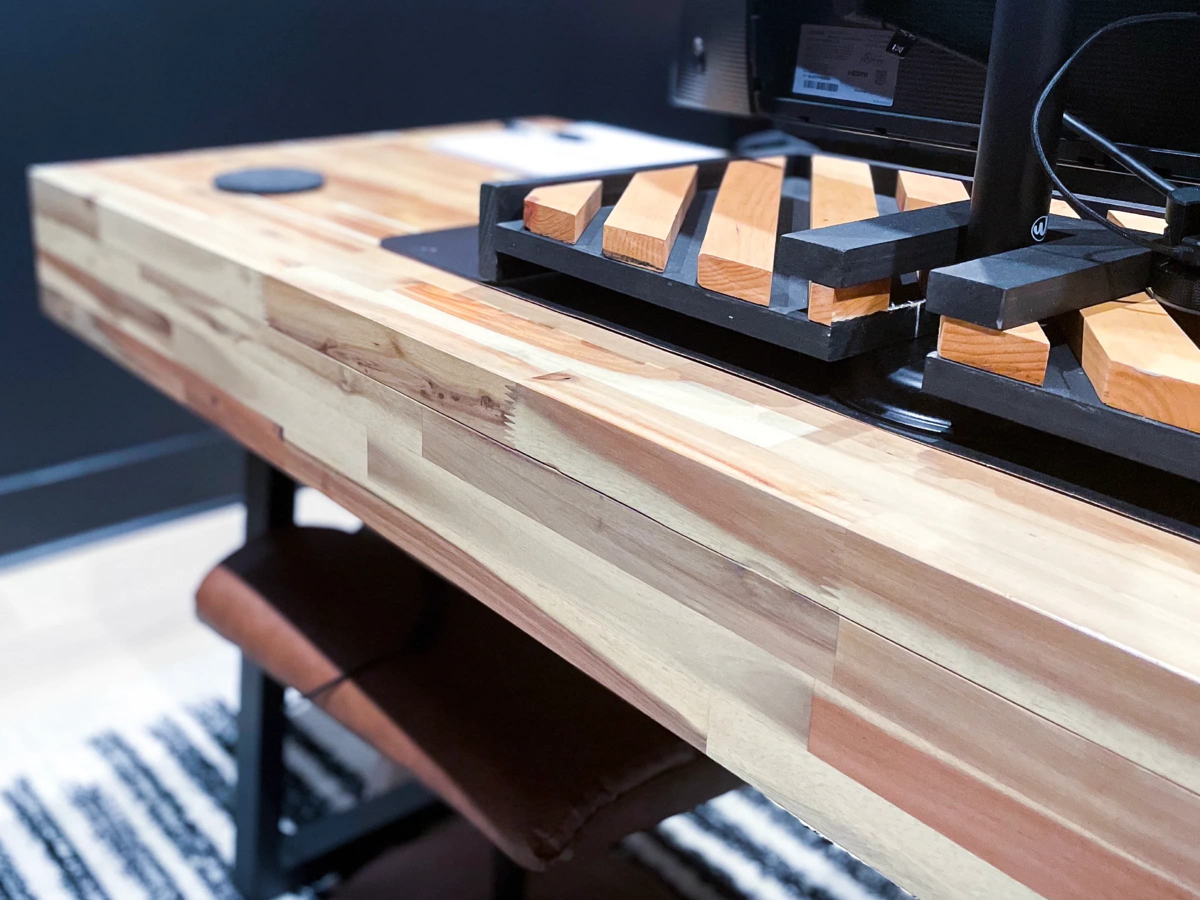 Custom wood desktop with a matching keyboard and monitor stand