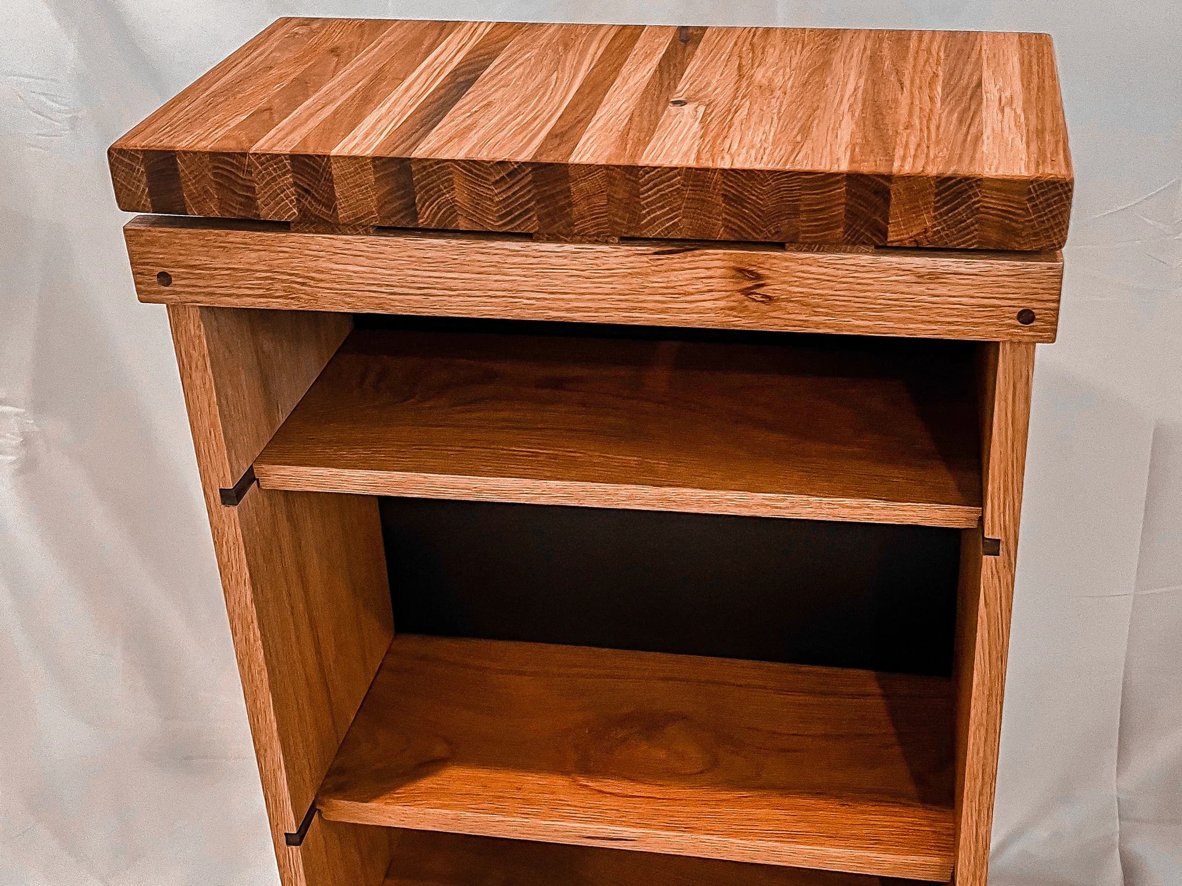 Custom wood bookshelf with a thick end-grain top