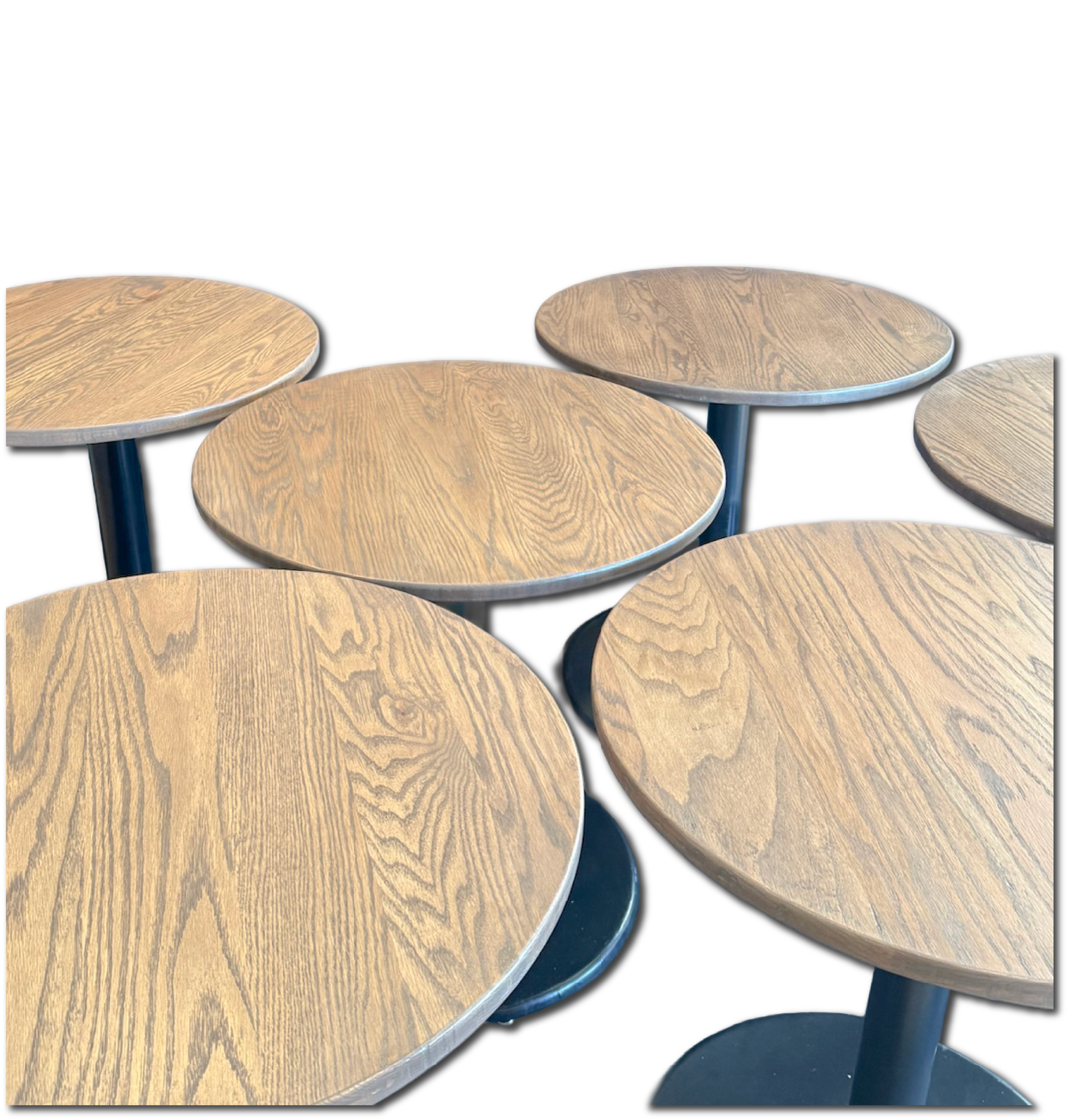 Custom round wood tables made for a commercial space