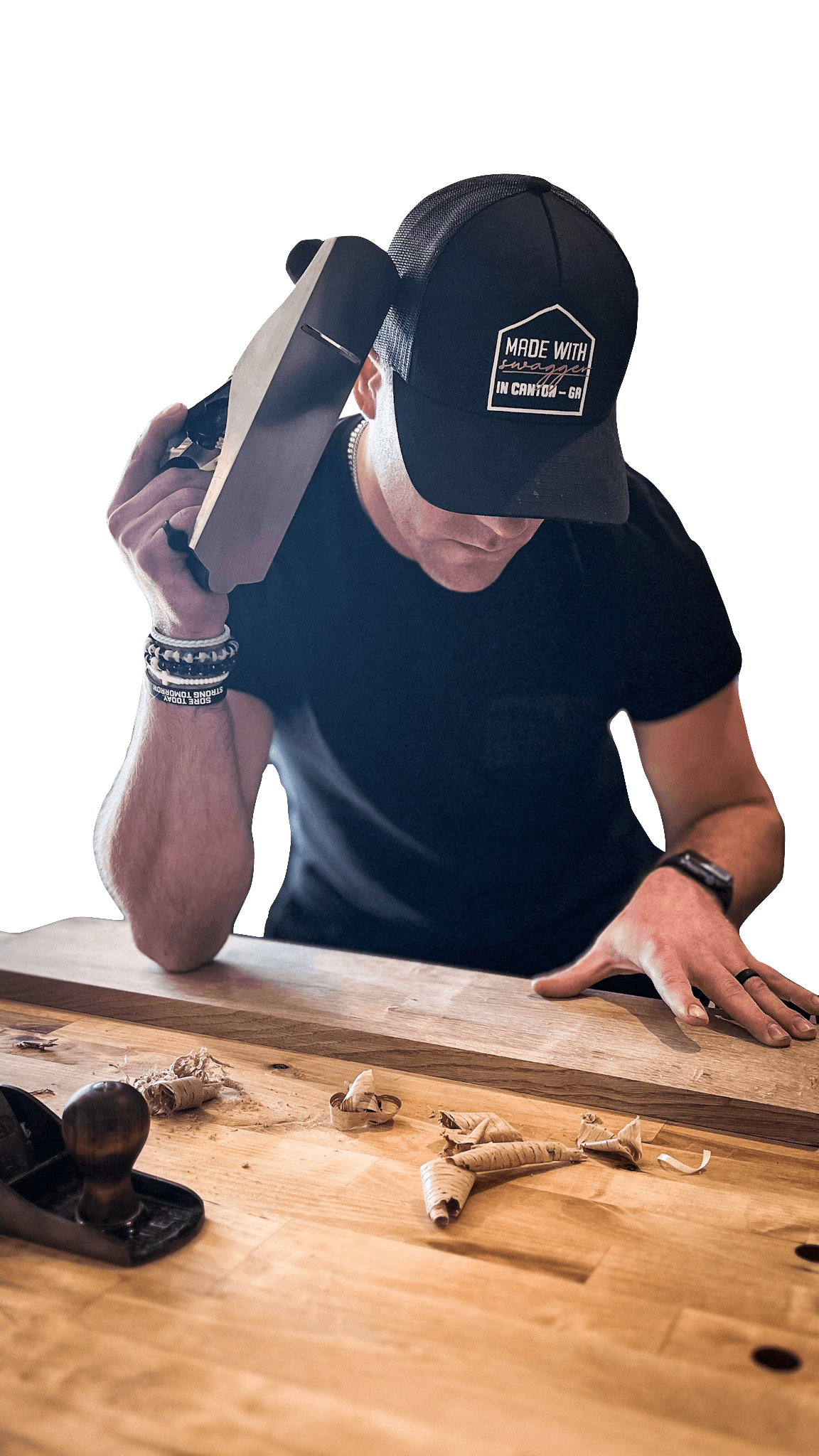 Matt Frate planing a board in the Still Am Studios workshop