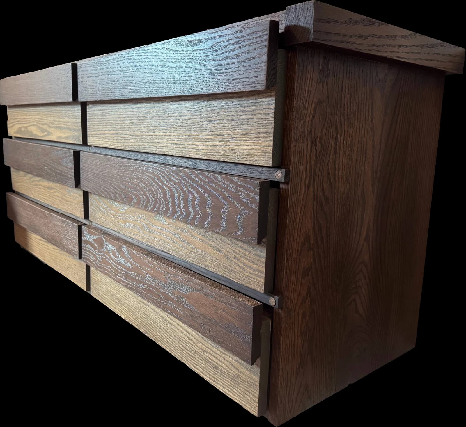 A custom hardwood dresser with contrasting grain and finish details