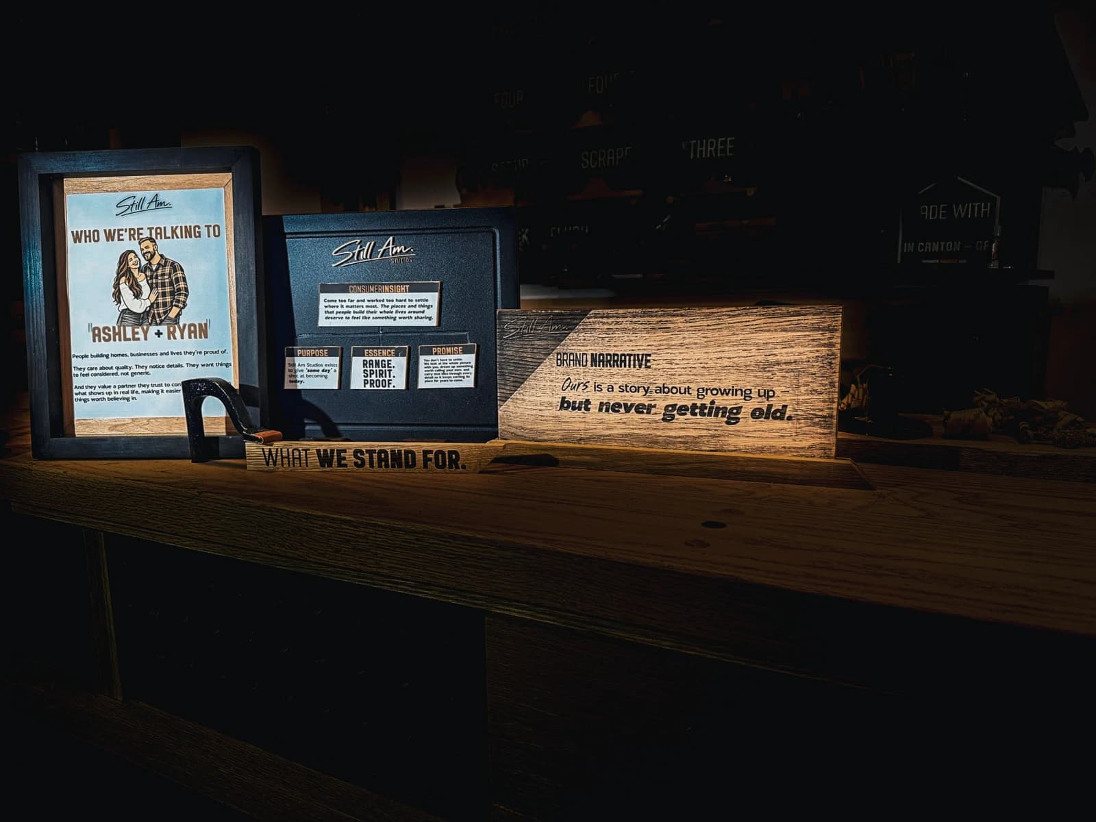 Brand strategy displayed on a workshop bench: audience, positioning, and brand narrative